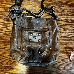 Juicy Couture grayish/brown purse. Only worn once.